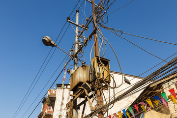 Outdoor electric transformer in Kathmandu, Nepal. electrical substation and wires
