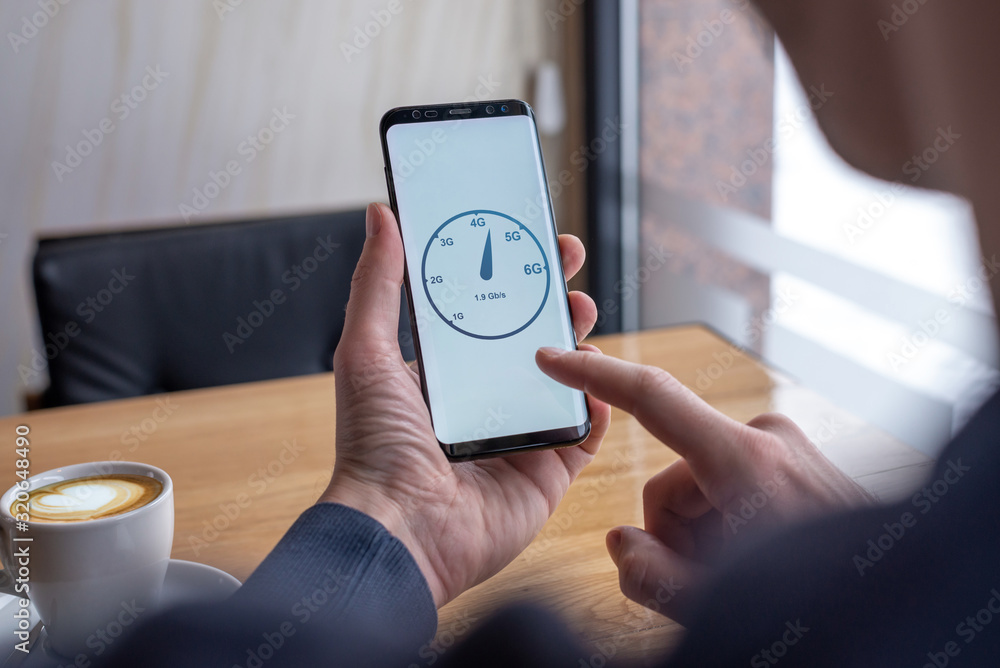 Poster Man testing speed network with mobile phone. Concept of network speed and generations