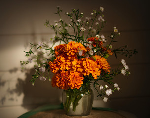 still life of flowering plants in vintage style.