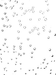 Bubbles of soda water on the glass. Abstraction on white background