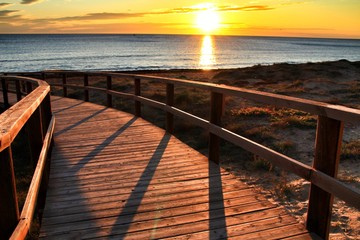Obraz na płótnie Canvas Sunrise on the beach in Arenales del Sol, Alicante
