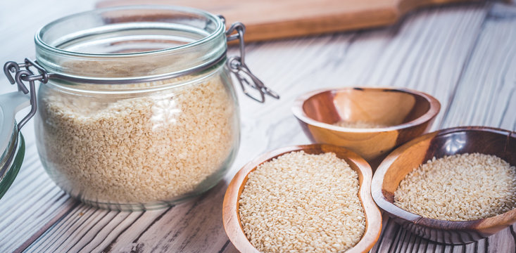 Sesame seeds isolated in bowls