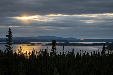 landscape of a sunset. Lake Manicouagan in Quebec. Mountain landscape with lake