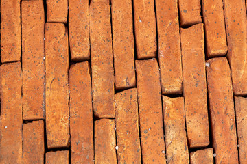 Newly laid red ground tile on a street