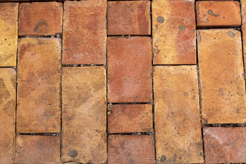 Newly laid red ground tile on a street