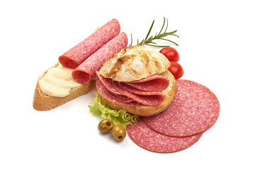 Thin salami sausage slices, isolated on white background