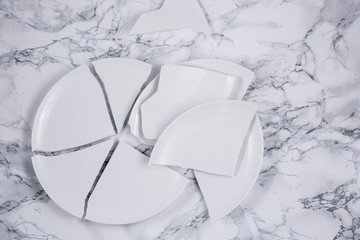 Broken Plate or broken  glass on the on the floor in the kitchen The concept of accidents in the...