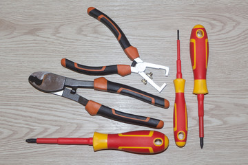 Set of professional electrician tools : screwdrivers, wire cutters and wire stripper