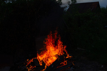 Bonfire outdoors in the evening