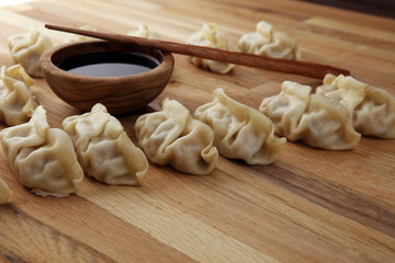 Gyoza or dumplings snack with soy sauce.