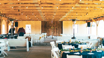 Country barn wedding with equestrian theme and unity cross
