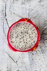 Fresh Dragon fruit or pitahaya with wooden background