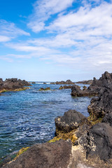 Fototapeta na wymiar Wide angle of volcanic coast in Biscoitos, Terceira, Azores, Portugal