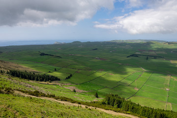 Obraz premium Farmland fields from Serra do Cume viewpoint in the Terceira island, Portugal