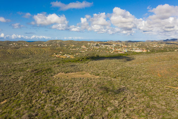 Aerial view of coast of Curaçao in the Caribbean Sea with turquoise water, cliff, beach and...