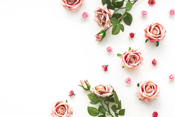 Pink flowers on white background, flat lay, top view