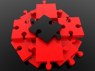 A red puzzle pyramid with a black puzzle at the top