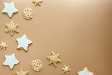 Gold Festive Background. Christmas Celebratory Template Decorated with Snowflakes and Star Shaped Cookies, Top View    