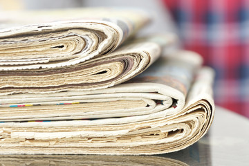 Newspapers Stacked in Pile. Pages with News on Table. Magazines with Headlines and Articles in Office. Tabloid Journals for Business Concept