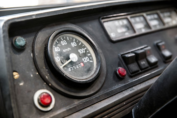 Fototapeta premium Closeup of old analog car indicators