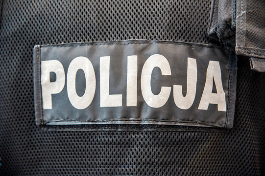 POLICJA inscription on the polish police uniform