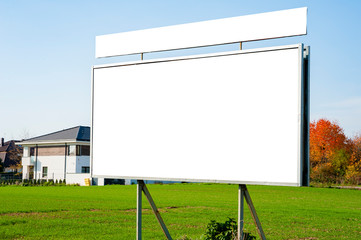 Blank white advertising billboard on the residential area