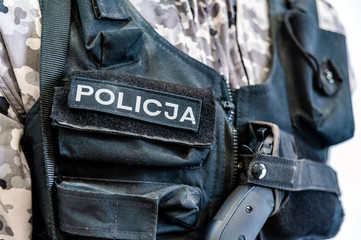 Fototapeta na wymiar POLICJA inscription on the polish police uniform