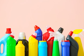 Set of cleaning supplies on color background