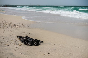 Garbage on the city beach. Ocean pollution