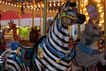 Fototapeta na wymiar Zebra on Vintage Merry-Go-Round