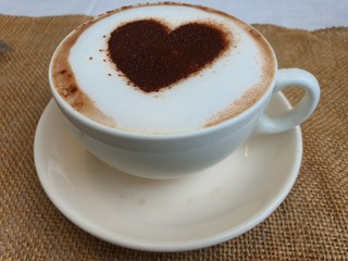 a cup of hot cappucino