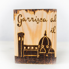 the ancient art of pyrography, wood and fire, the symbols of the city of Florence