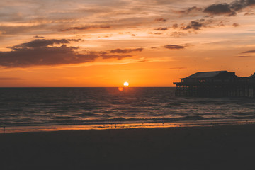 Vintage Effect Photo Filter: Blackpool Central Pier and Ferris Wheel, Lancashire, England, UK. Awesome sunset, soft colours. Perfect evening.