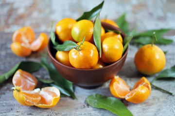 Fresh tangerines. Tangerine leaves. Vitamins Citruses.