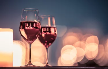 Gordijnen Candlelight dinner with wine and romantic city view © kieferpix