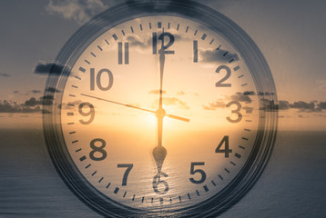 Clock showing time 6am in the morning. New day concept. 