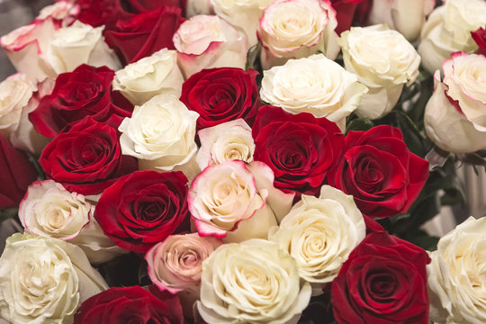 Bouquet of red and white roses.
