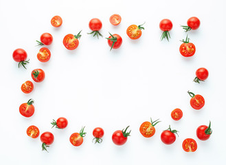 Naklejka na ściany i meble cherry tomatoes on white background top view