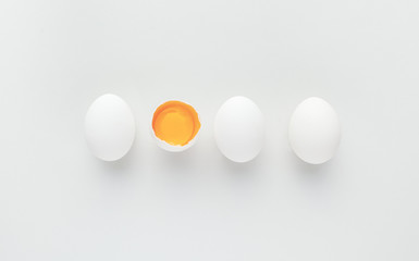 chicken eggs on a gray background