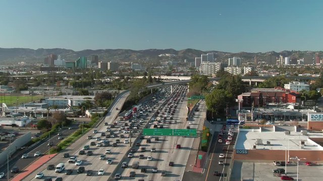 Aerial view of congested urban traffic on a West Los Angeles Santa Monica freeway during the day