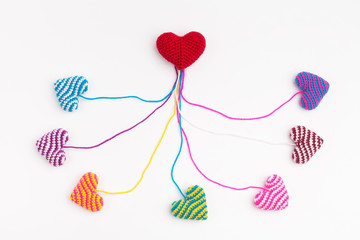 Сomposition of knitted hearts. Сoncept of healthy life.