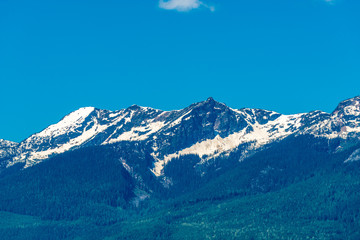 Obraz premium Rocky Mountains. Mountains with white cloud in British Columbia, Canada.