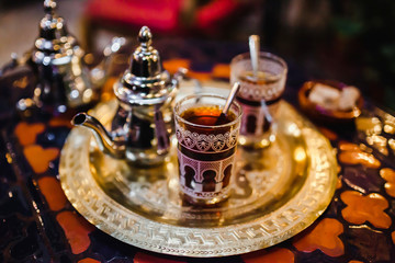 traditional Arabic tea cup, arab people drinking tea in Ramadan