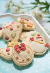 Gingerbread and christmas cookies on a wooden background