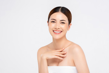 Beauty shot of youthful bright skin smiling pretty Asian woman