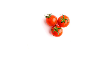 Fresh cherry tomatoes on white background,Food concept background with space.