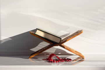 Quran - Muslims around the world put on wooden boards. Quran in mosque - Open for prayer.