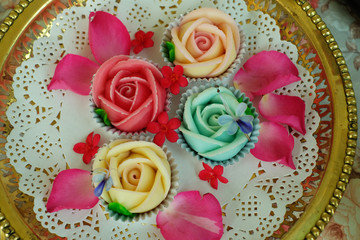 Thai traditional sweet dessert in rose form descended from the women of the Palace