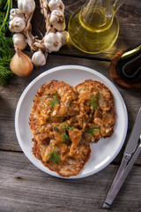 Tasty homemade potato pancakes with meat and mushrooms