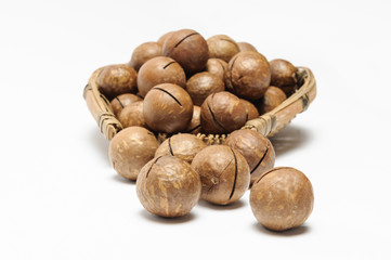 dried Macadamia nuts on white background